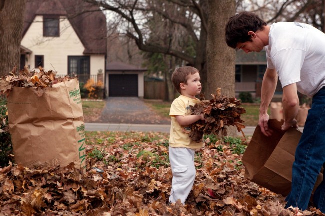 Sam helps Ted bag leaves in our front yard. Sam is three and a half years old.