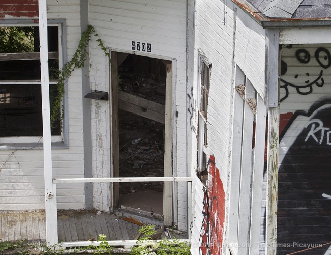 STAFF PHOTO BY TED JACKSON Front porch at St. Claude Ave. at Industrial Canal, photographed from bridge, 2014. Scenes of Katrina, 9 years later, photographed July and August 2014. (Photo by Ted Jackson, Nola.com | The Times-Picayune)