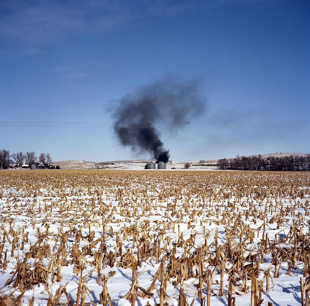 A fire burns on a corn farm in Antelope county, along U.S. Route 275. The proposed Keystone XL pipeline would cross through large patches of farms and ranches in the county.