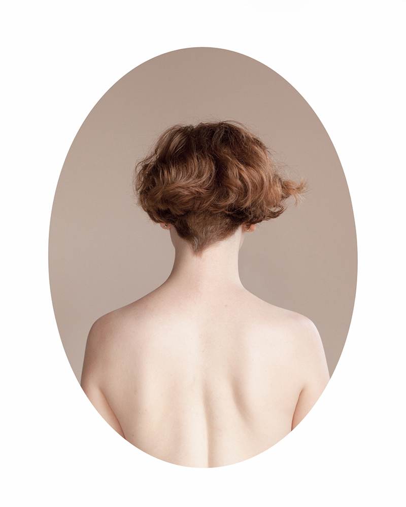 “a modern hair study” consists of portraits of young women photographed from behind.  By focusing on the back, the viewer is forced to contend with all of the peripheral things that make each woman unique.