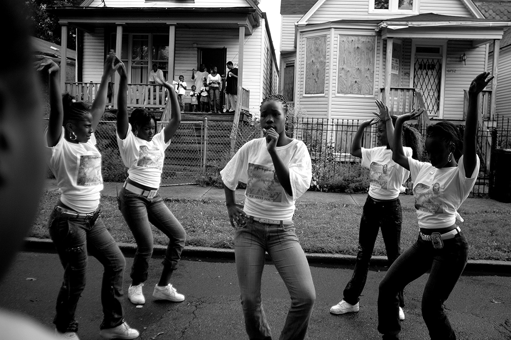 Girls in the Englewood neighborhood on Chicago’s South Side attend a block party to celebrate the lives of Starkeisha Reed, 14, and Siretha White, 12. Starkeisha and Siretha were killed days apart in March 2006. The girls’ mothers were friends, and both grew up on Honore Street, where the celebration took place. Englewood, Chicago, 2008