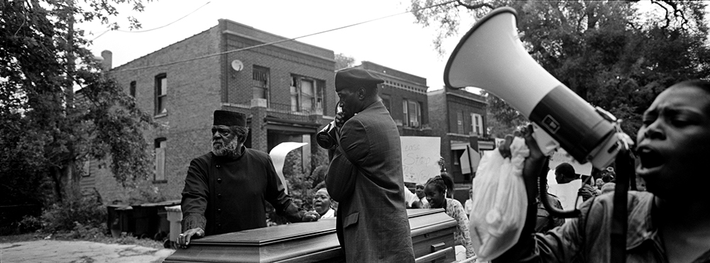Angry community members, business owners and church pastors marched through Chicago’s South Side to protest the overwhelming number of murders that took place in October of that year. Greater Grand Crossing, Chicago, 2009