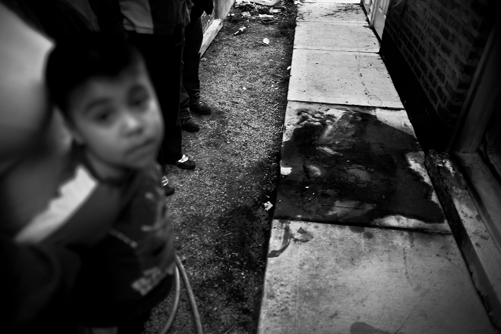 Alex Arellano, 15, was shot and burned after being hit with bats and then struck by a car that was chasing him. Gage Park, Chicago, 2009