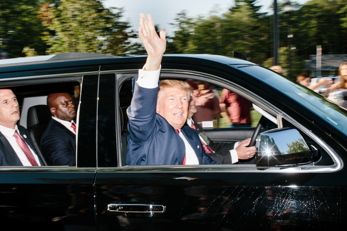 Real estate mogul and Republican presidential candidate Donald Trump arrives at a rally at the Weirs Beach Community Center in Laconia, New Hampshire.