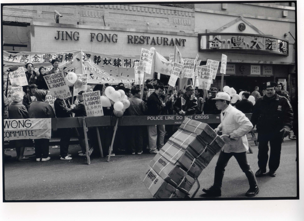 Picketing restaurant waiters and community members protest outside Jing Fong Restaurant whose management illegally took waiters’ tips to pay for social security. NY State Attorney General fined the largest restaurant in Chinatown $1.13 million in 1995. © Corky Lee