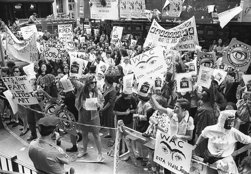 The Women's Action Coalition demonstrates at the opening of the Guggenheim Soho to protest the lack of women artists in the museum’s inaugural exhibition. June 25, 1992. © Lisa Kahane