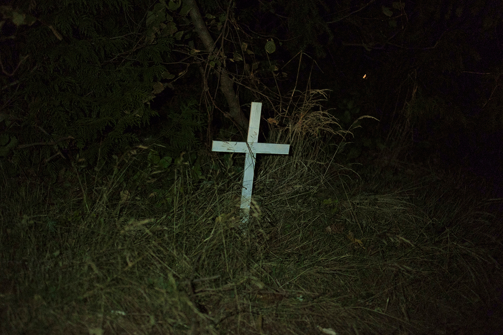 Roadside memorial along Star Lake Road, near the dump site of multiple victims.