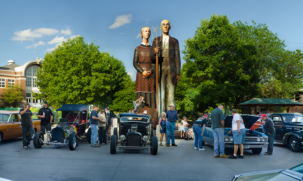 Seward Johnson's hysterical homage to Iowa painter Grant Wood looms over a car club meeting at the Iowa State Fairgrounds; Des Moines, Iowa USA ©Rich Frishman ALL RIGHTS RESERVED