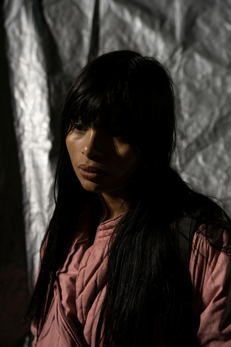 Portrait of Maryuri Celeste,18, from Santa Rosa Honduras in Tijuana Mexico on November 30, 2018.  Photo by Kitra Cahana / MAPS