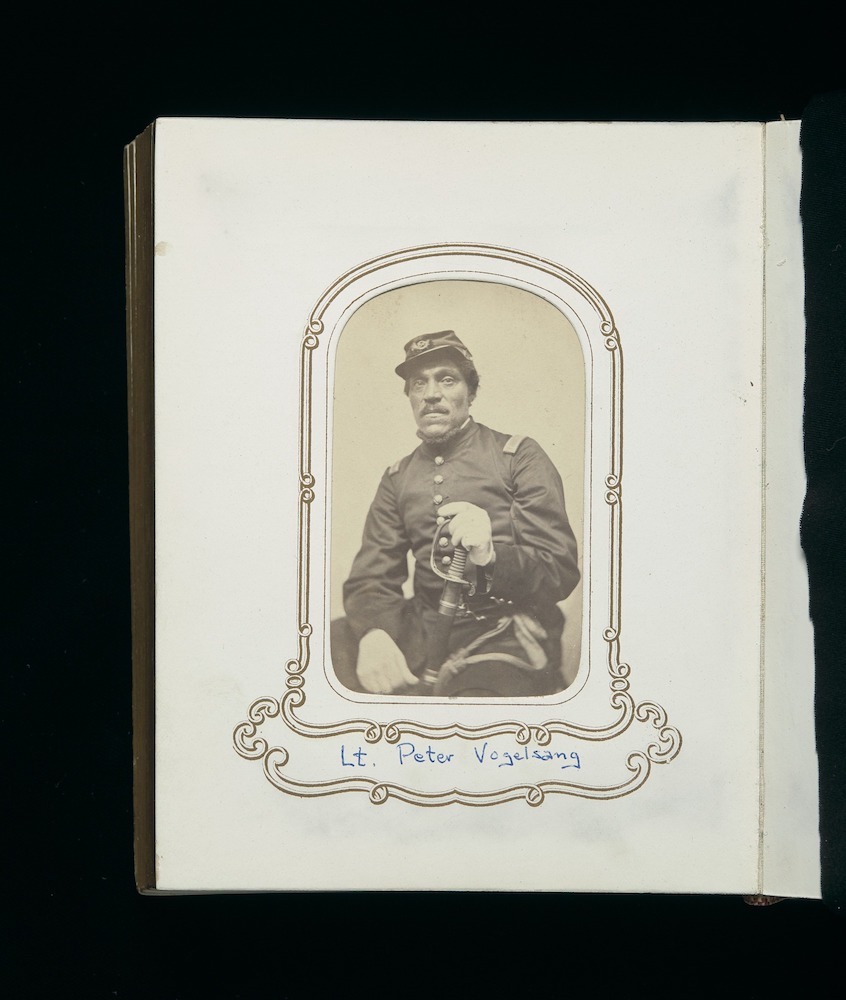 Carte de visite album of men and officers of the Mass. 54th Regiment, assembled by John Ritchie, regimental quartermaster; many photos are signed on the back