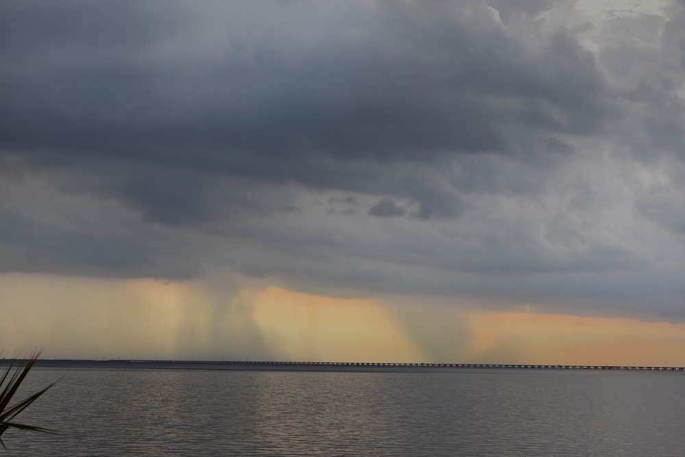 Color photo of double rainstorms on Lake Pontchartrain in Slidell, Louisiana.