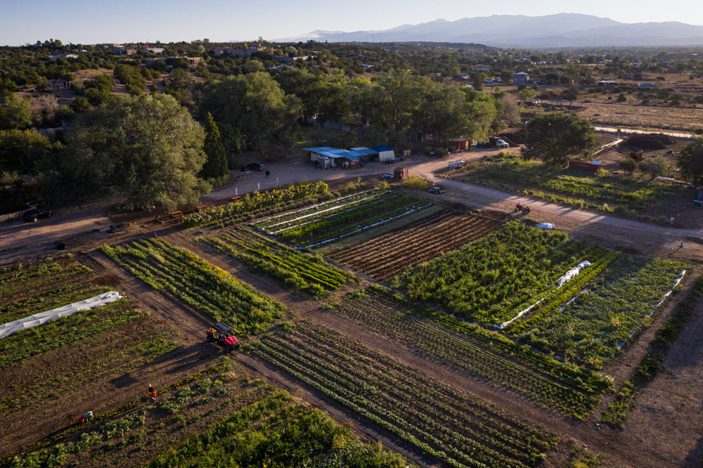 Reunity Resources, a community farm in Santa Fe, New Mexico has gradually expanded to include a composting facility, gardens, a farm stand, food truck and youth training programs.