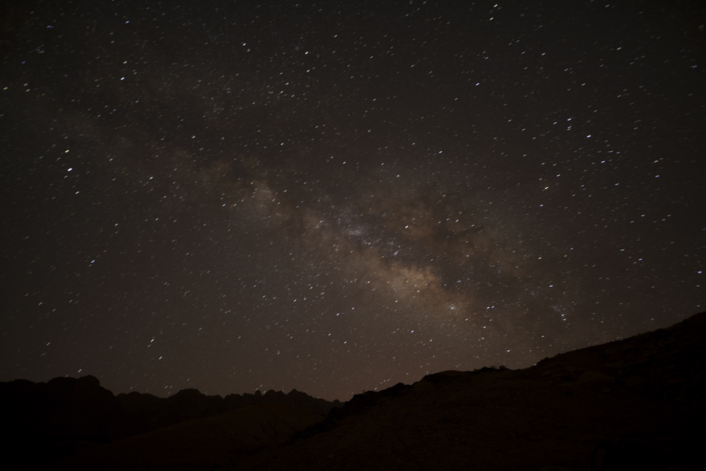 “We’re almost there” -A Bedou’ white lie to get you to the top of the mountain. The Milkyway appears on top of Sheikh Awad village which only gets electricity for 5 hours a day. Stars has long been the Bedou' guide through the desert.