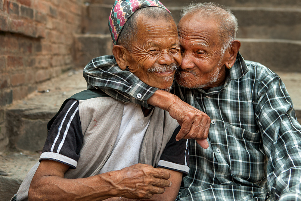 Two old-time friends meet in the streets of Kathmandu, Nepal.