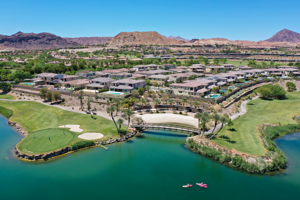 Luxury developments line the edges of Lake Las Vegas, an artificial reservoir created in 1990 on top of the wash that channels water from Las Vegas to Lake Mead. The lake itself is filled with water that is regularly recycled from Lake Mead.