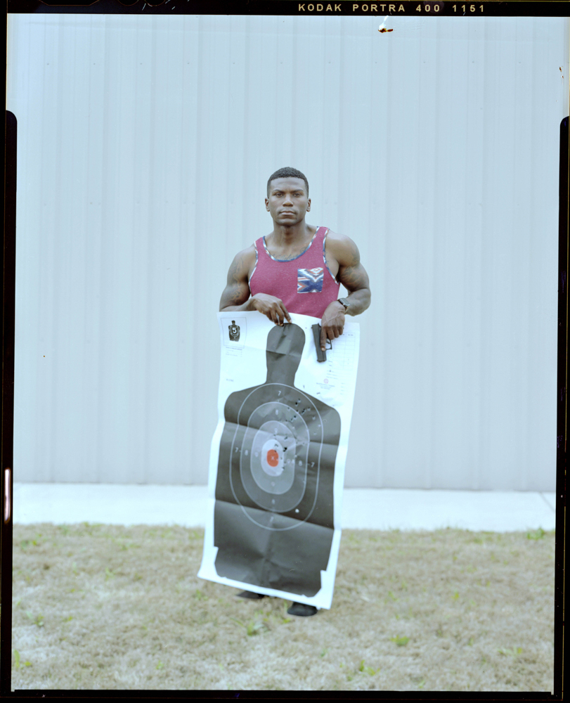 Lindberg Wilborn, 32, stands holding the target he used to qualify for his license to carry outside a local gun range on Saturday, March 27, 2021 in Killeen, TX. He has owned his firearm for about 3 months. “Society looks at black men as predators and scary people so most of us are scared to own a firearm in fear of fueling the fear that already exists,” Wilborn said.