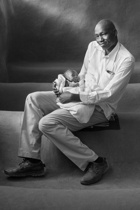 Betty Press_Marti Corn_Peter and his 2-week old son Ayuen_2018