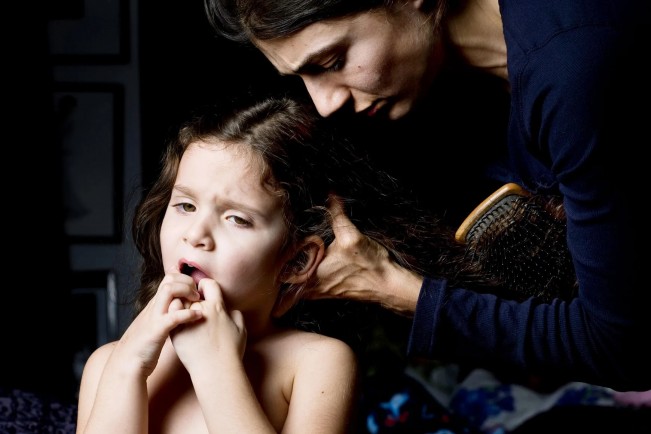Megan Jacobs-Elinor Carruci-Brushing hair, 2010