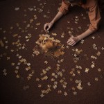 girl with puzzle of jesus