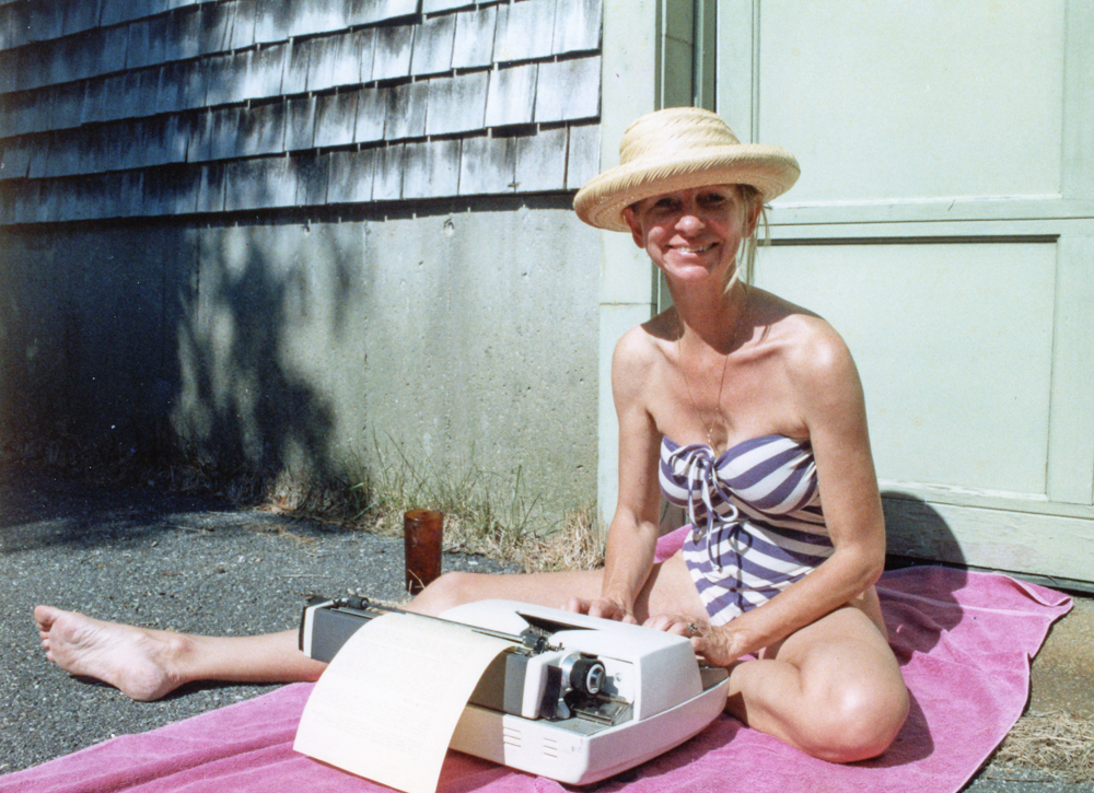 ©Lisa, McCord, Mother in Bathing Suit with Typewriter, @lisamccord, www.lisamccordphotography.com - Lisa McCord