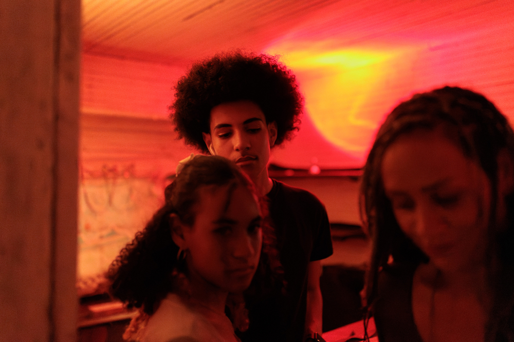 “Homecoming After Party” Siblings Leah Moore, 15, and Dominic Moore, 17, attend the Moatstown Homecoming after party with their aunt, Myowne Moats, in the former Moatstown School in Dunmore, West Virginia. The school was the educational hub for the community until integration. August 16, 2025.