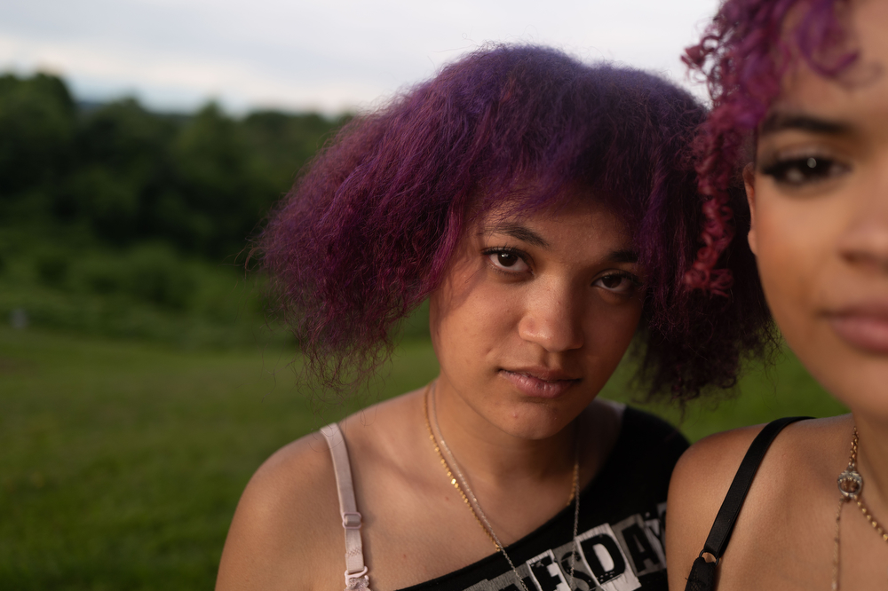 Kaydra Jackson, 20, left and her sister Richiyah Jackson, 16, at the Juneteenth celebration in the Texana community in Murphy, North Carolina, June 20, 2026.