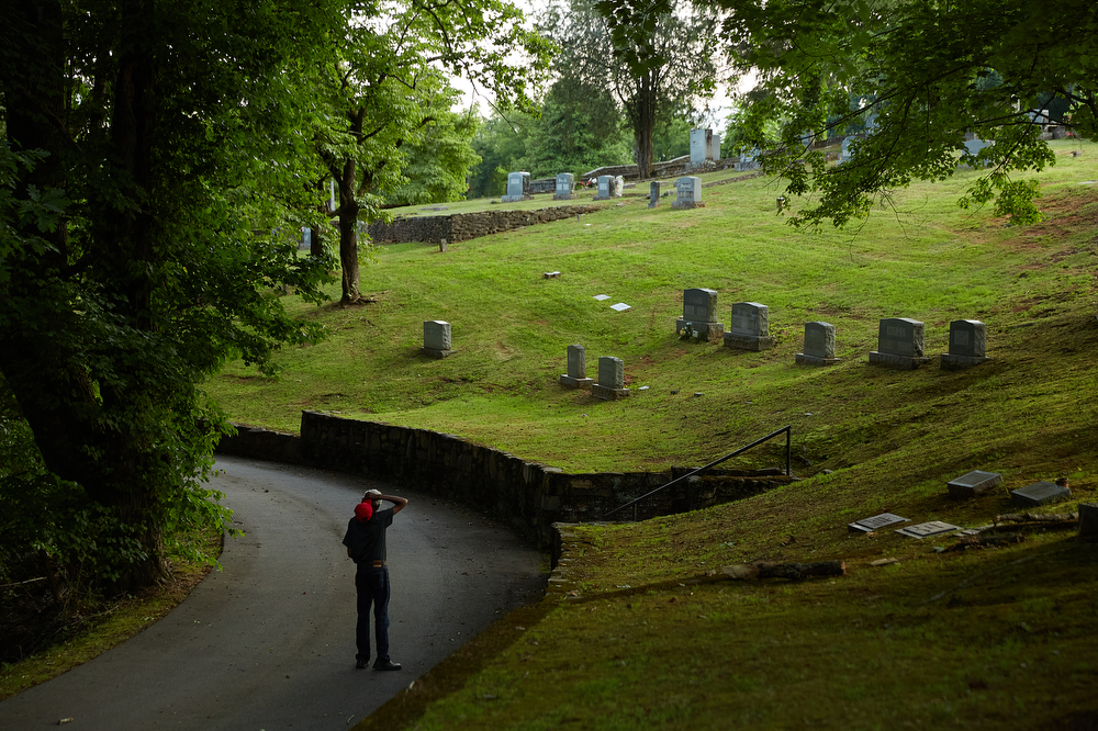William "Tank" Coward’s daily walk takes him by Keener Cemetery in Sylva, NC, June 25, 2016. He remembers when the cemetery was surrounded by a Black community.